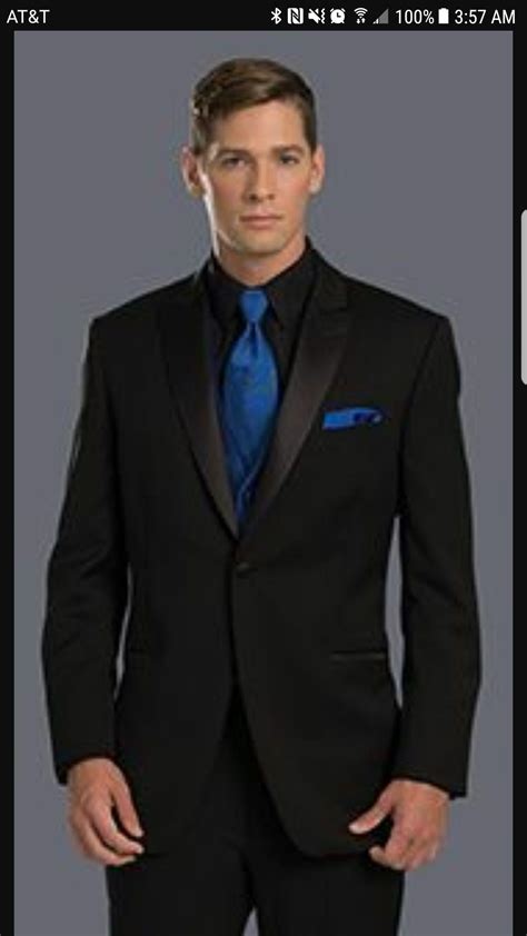 black suit dark blue tie.